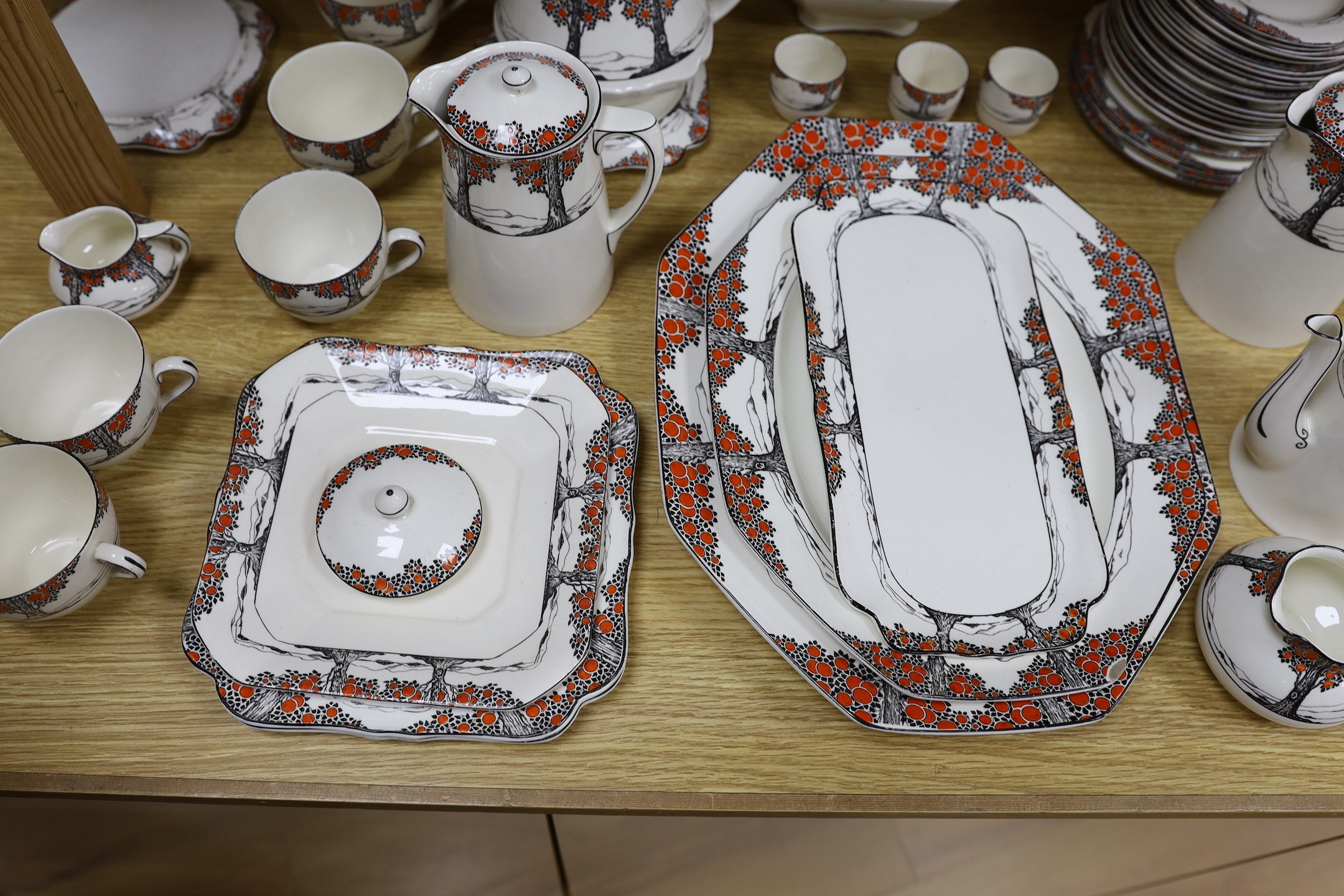 A large quantity of Crown Ducal Orange Tree pattern tea, coffee and dinner wares